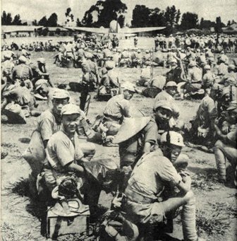  Chinese infantrymen await transport to Kwangsi Province 